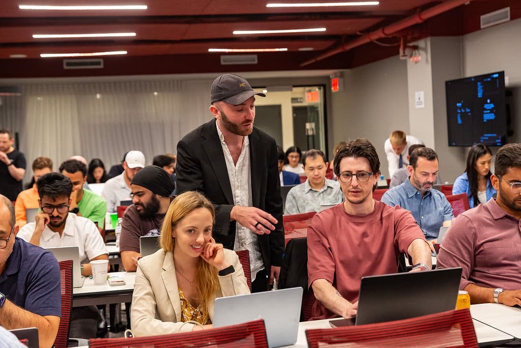 Harry Roper speaking with attendees during the New York Tech Week Claude Code event.